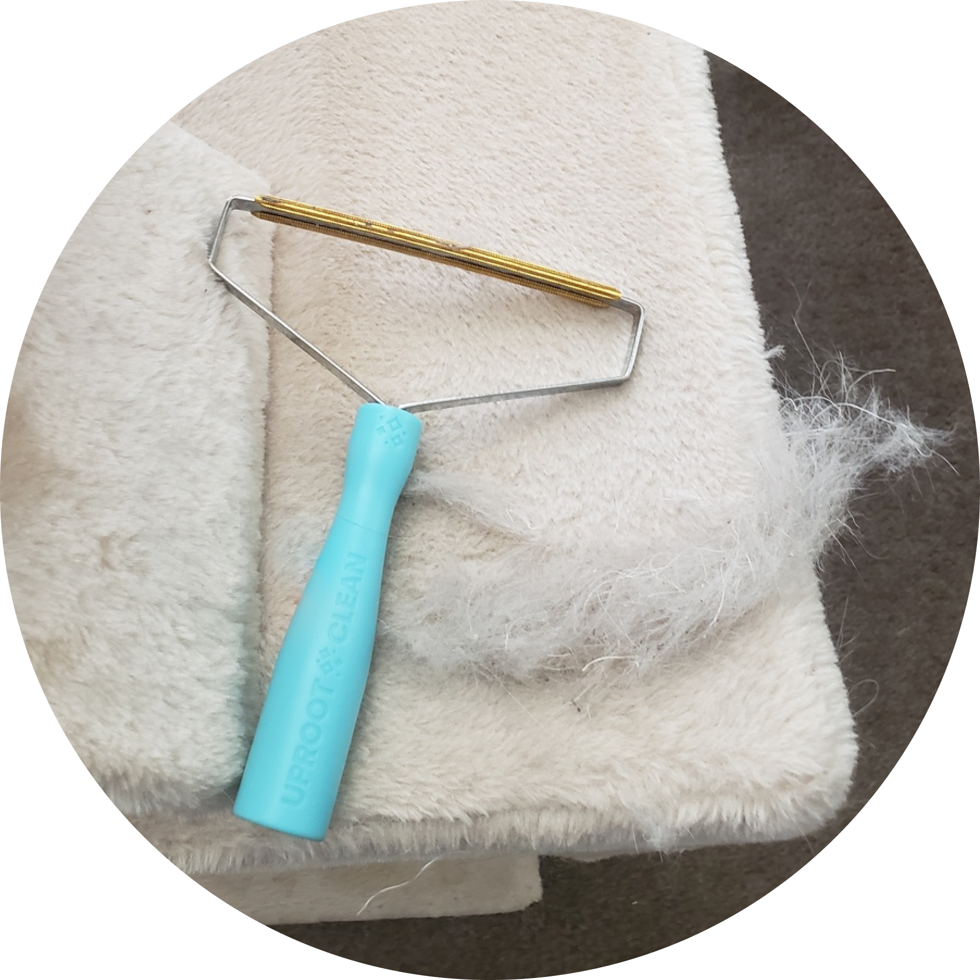 Uproot Clean hair remover on a pet bed